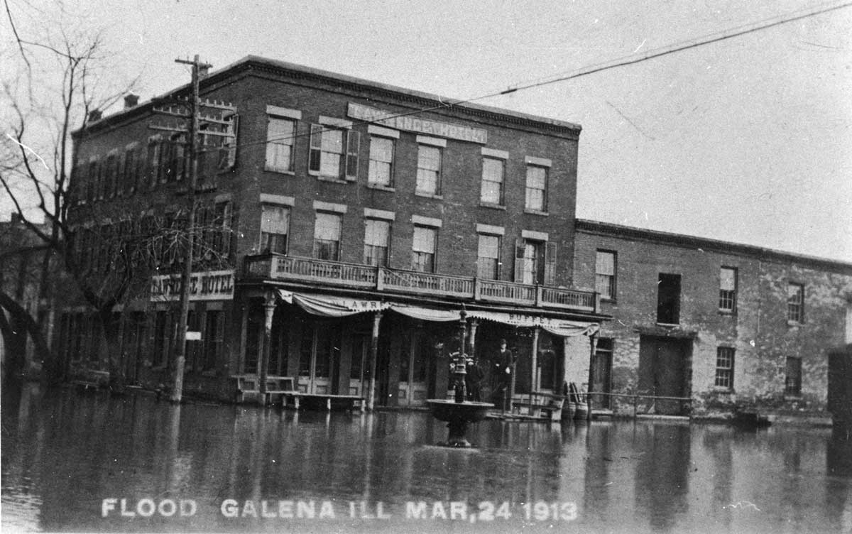 Flooded Commerce Street near Lawrence Hotel